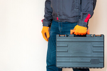  Hand with a case. gloves, tool box, person