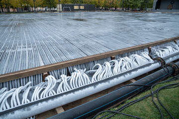 Close up of flexible refrigerated hoses filled with frozen water. Modern engineering system for...