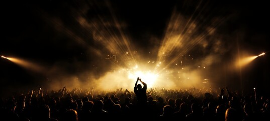 Captivating and energetic crowd dancing and grooving in unison at a vibrant concert scene