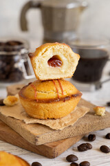 Pasticciotto leccese pastry filled with egg custard cream and sour cherry jam close up