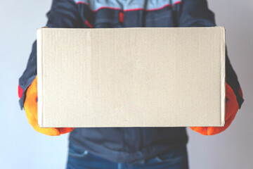 man with box. cardboard with copy space