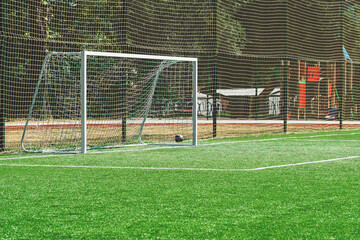 soccer gates. Football goal at the stadium. Football field with artificial lawn. Concept other party of soccer.  At stadium.