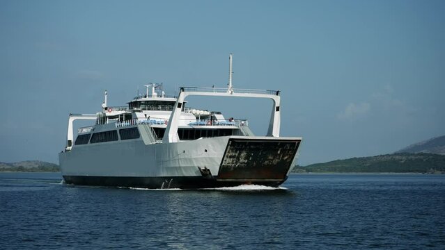 Car ferry boat in Greece linking the island Corfu to mainland transporting goods and vehicles