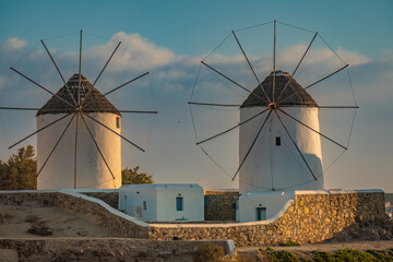 The iconic Mykonos windmills Mykonos island, Cyclades Islands, Aegean Sea, Greece, Built by the Venetians in the 16th c. to mill wheat - obrazy, fototapety, plakaty