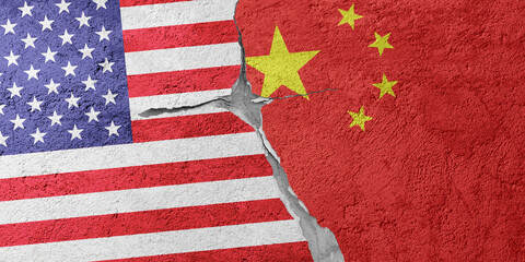 USA and China flags on a stone wall with a crack, illustration of the concept of a global crisis in political and economic relations