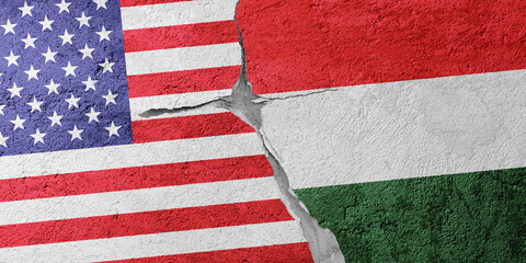 USA and Hungary flags on a stone wall with a crack, illustration of the concept of a global crisis in political and economic relations