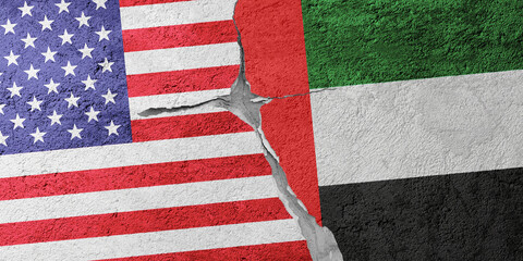 USA and United Arab Emirates flags on a stone wall with a crack, illustration of the concept of a...