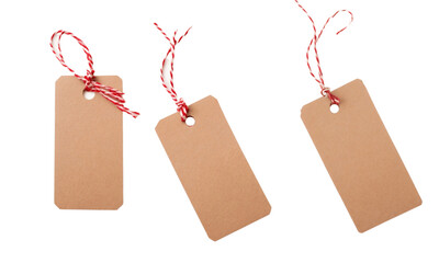 Set/collection of three brown natural craft kraft paper hang tags, price tags, or gift tags with striped red and white baker's twine.