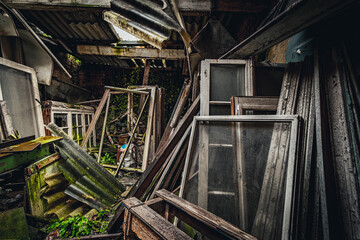 The abandoned paint shop with living house.