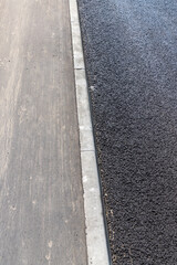 Fototapeta premium a close-up of a part of a new paved road