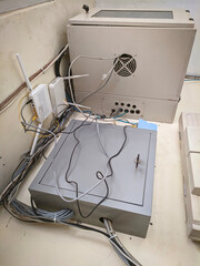 Internet wires and telephone cable on the wall