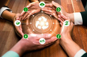Business partnership form circular hand together around recycle icon symbolize ESG sustainable...