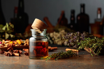 Essential herbal tincture in a small glass bottle.