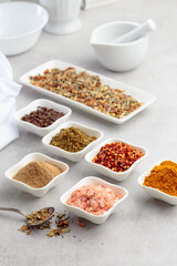 Various spices on a kitchen table.