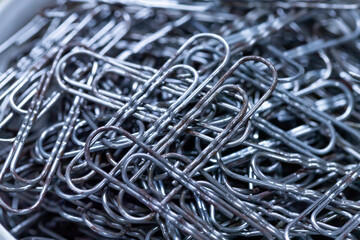 Metal paper clips close up. Old clips.