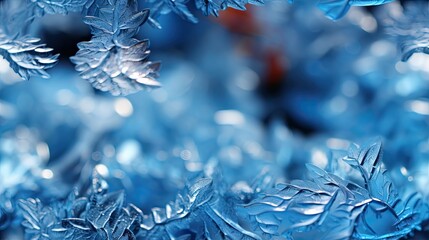  a close up of a bunch of blue snowflakes on a blue background with a blurry image of snow flakes in the foreground.