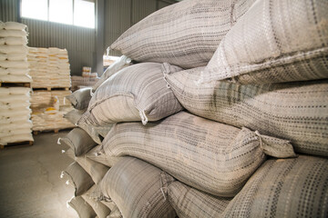 Fototapeta na wymiar Food warehouse. Bags of rice, sugar, flour and other products.