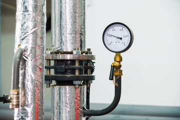 Manometer, pipes and faucet valves of heating system