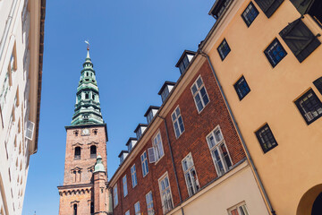 Fototapeta na wymiar Downtown Copenhagen with old houses and church.