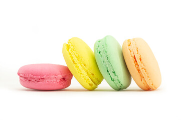 French dessert colorful macarons isolated on white background