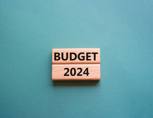 Budget 2024 symbol. Wooden blocks with words Budget 2024. Beautiful grey green background. Business and Budget 2024 concept. Copy space.