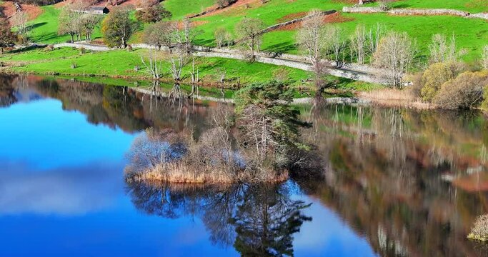 Majestic autumnal view of Lake Waters in Rydal, lake district area of United Kingdom. 