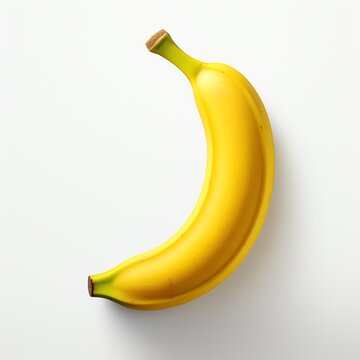 a banana on a white surface