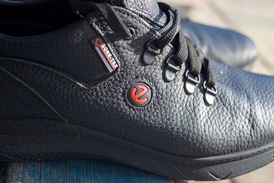 Teplyk, Ukraine - November, 17 2023: Part of a black leather sneakers comfortable shoes for walks.