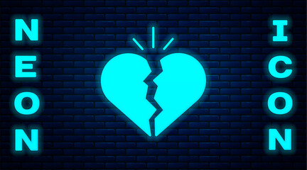 Glowing neon Broken heart or divorce icon isolated on brick wall background. Love symbol. Valentines day. Vector