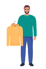 Smiling young man holding hanger with yellow hoody. Choosing clothes concept. Vector illustration in flat style.