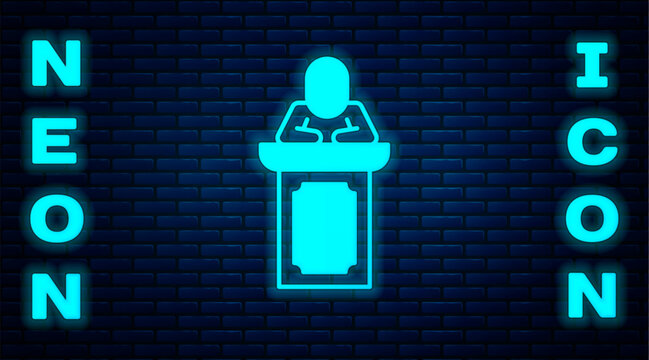 Glowing neon Auction auctioneer sells icon isolated on brick wall background. Auction business, bid and sale. Vector
