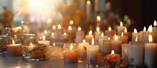 Burning candles on the cemetery at night. Selective focus.