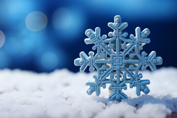 Snowflake from a constructor on a blue background copy space