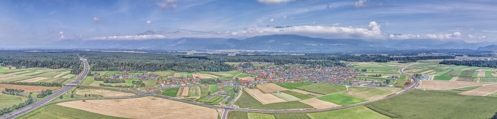 Fototapeta na wymiar Drone panorama over the Slovenian Alpine foothills from the town of Kranj