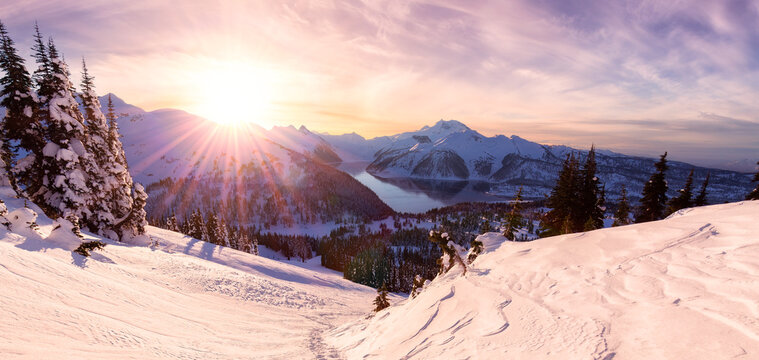 Winter Landscape in Canadian Mountain Landscape. Colorful Sunrise.