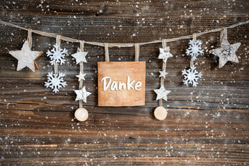 Wooden Decorated Christmas Label With Text Danke, Snowy