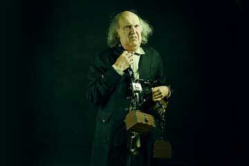 Fototapeta premium Ghost of Jacob Marley, Scrooge ex-business partner, chained with a padlock, carrying treasure chests and keys
