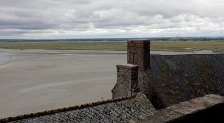 wide view of the plain at low tide seen from the Abbey of Mont Saint Michel in France