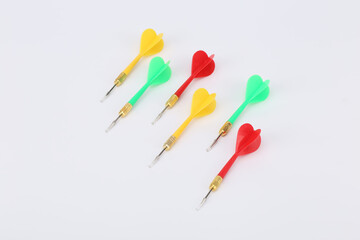 Red green and yellow dart isolated on white background. Darts on white background