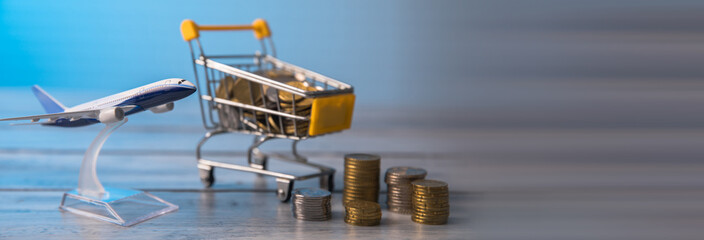 plane toy and stack of coin