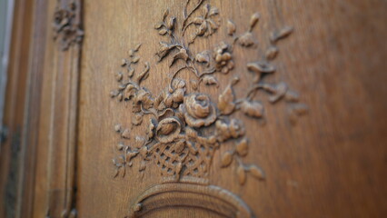 Ancient Door Elegance, Handcrafted Floral Motif on Wood. Floral Mastery on Wood, Timeless Handmade Door Ornamentation