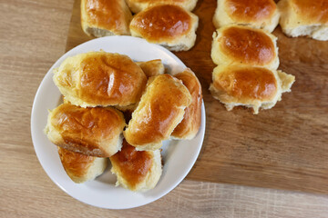 Fresh, ruddy pies, fresh from the oven on a white plate. Delicious homemade dessert.