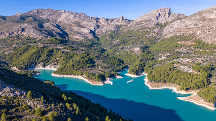 Aerial drone photo of the mountain lake named Guadalest in Alicante, Spain