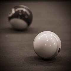 Striking composition of a billiard table, showcasing the allure and strategy of pool gaming. Black...