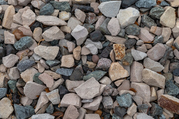 background of stone rocks and pebbles in gray, black and white. textured copy space