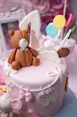 Bear decoration on the cake for first birthday