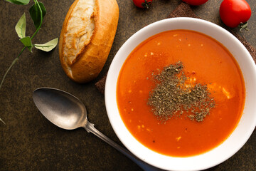 Delicious tomato soup with cheddar cheese