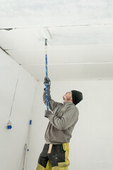 killed Professional Paints Garage in Pristine White, Transforming the Space Beautifully.