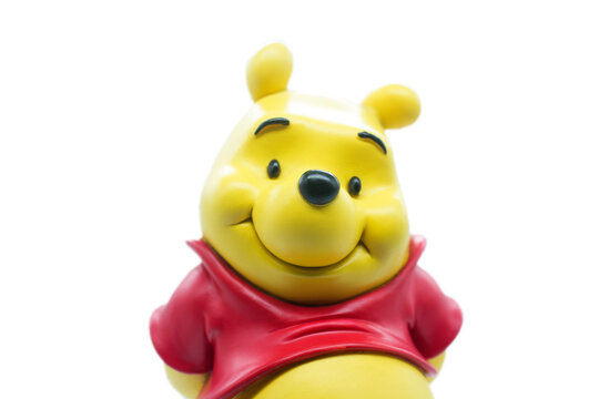 Studio image of Winnie the pooh with a white isolated background. 