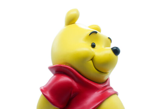 Studio image of Winnie the pooh with a white isolated background. 